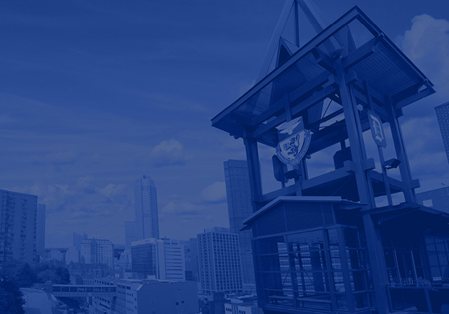 Blue style skyline image of Pittsburgh from the Duquesne University campus