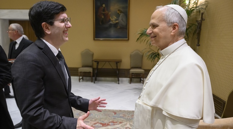 President Dausey meeting the Pope.