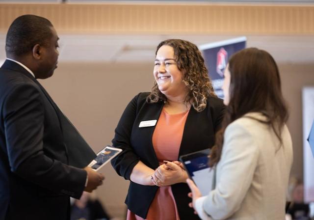 Student and employer talking at University Career Fair