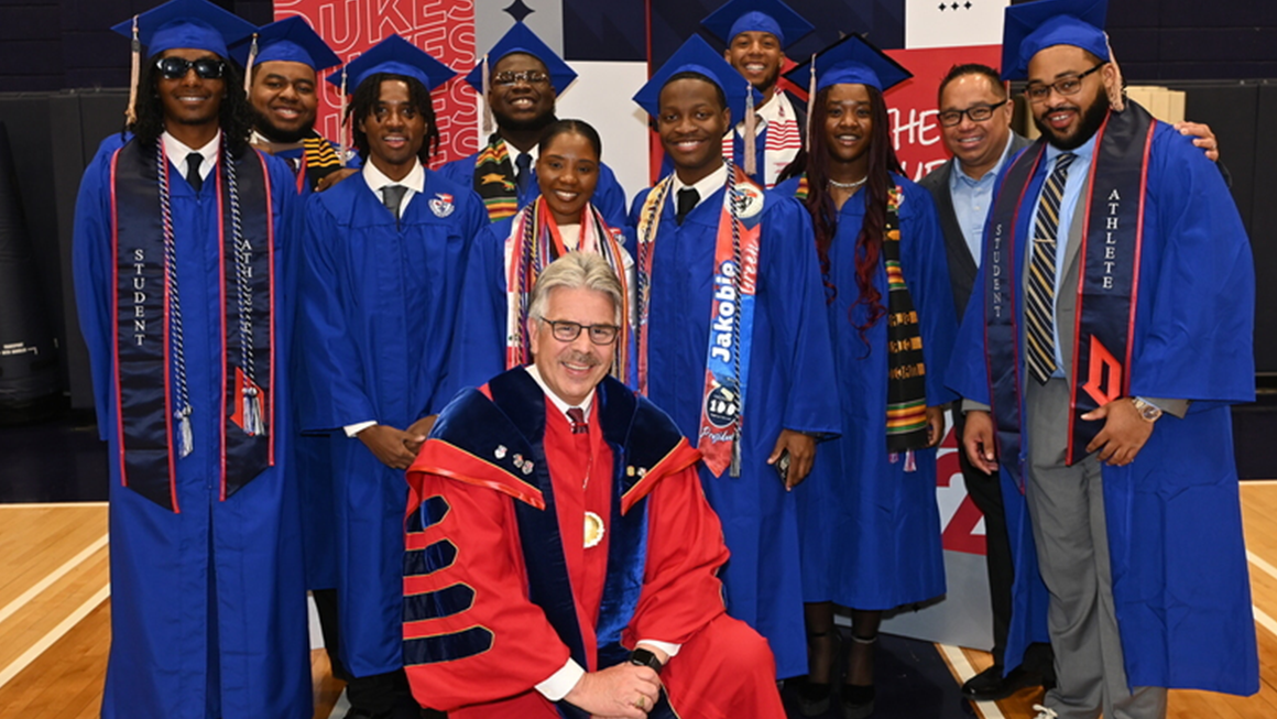 President Ken Gormley with 2025 graduates of the Palumbo-Donahue School of Business.
