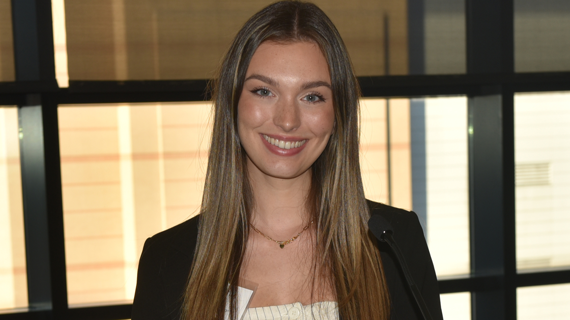 Brenna Sachs (B’25) hosting the annual Marketing Mixer networking event.