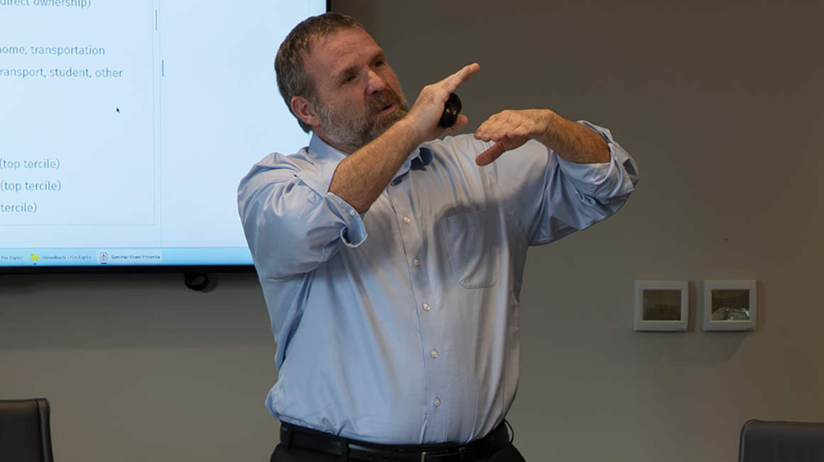 Dr. Favreau presenting his research