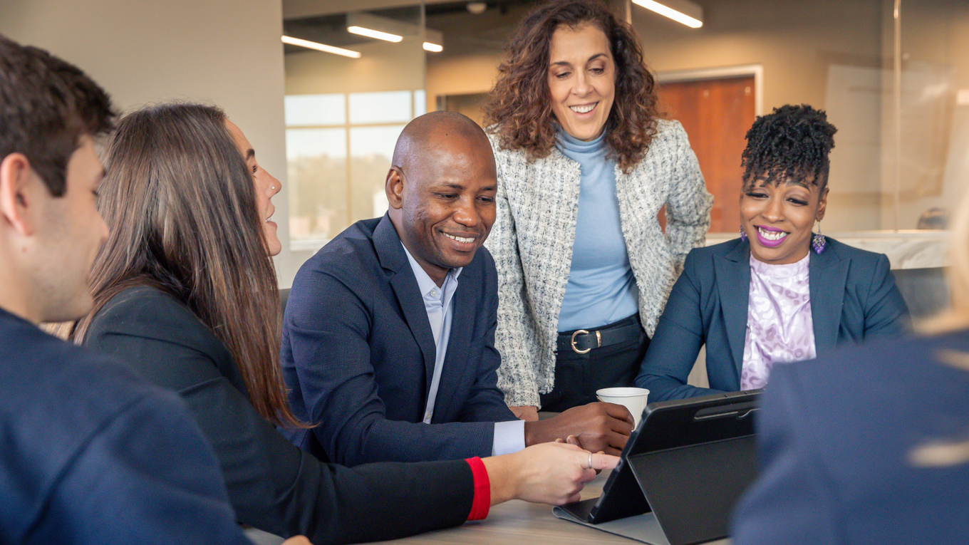 Graduate students work closely with a faculty member.