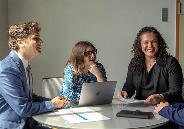 Three students working together.