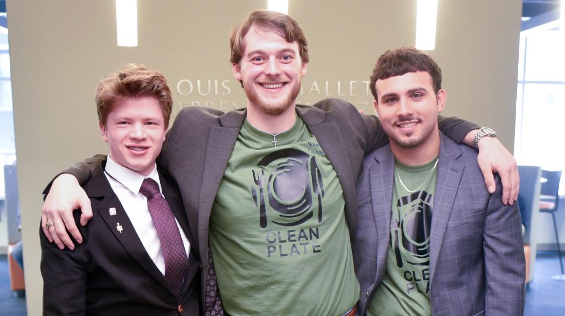 The Clean Plate Innovations team poses for a photo.