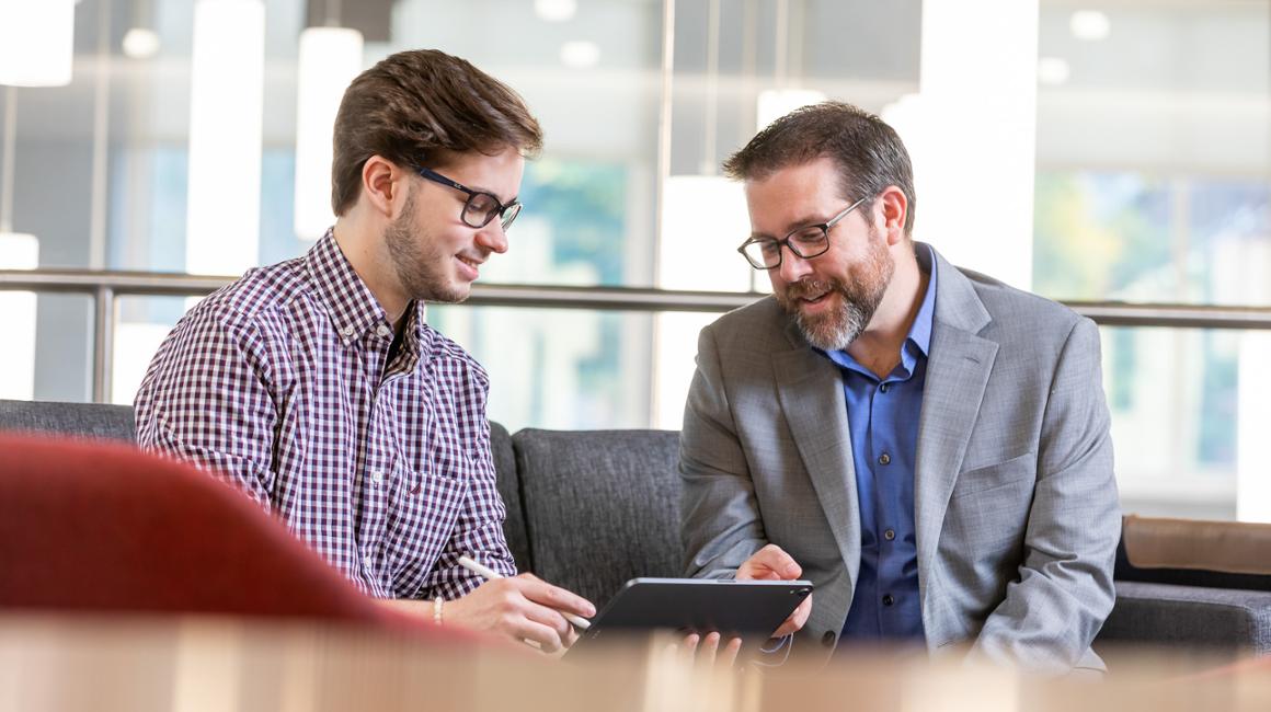 A Student Success Coach chats with a student.