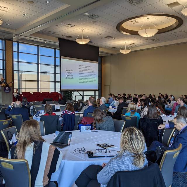 Image of attendees at College of Medicine Conference