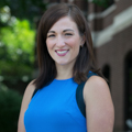 Headshot of Tara Abbot outside Canevin Hall with trees in background
