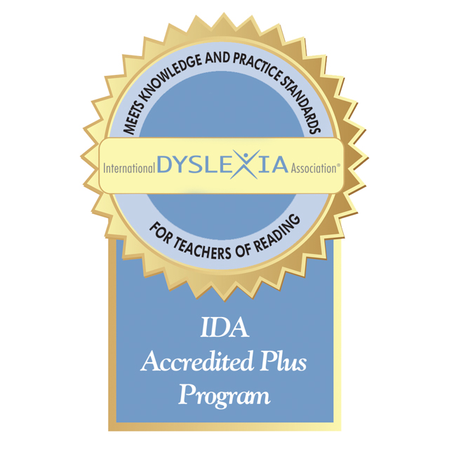 IDA logo that has gold and blue seal with text of International Dyslexia Association, IDA Accredited Plus Program, Meets knowledge and practice standards for teachers of reading.