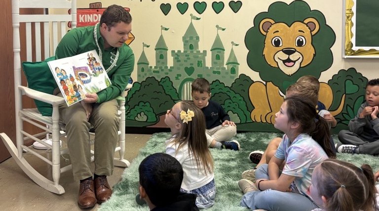 School of Education alumnus and graduate student Jonathan Barsotti reading to H.E.A.R.T. class of elementary students in South Fayette photo credit Kellen Stepler | TribLive