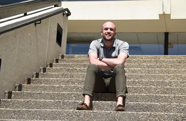 Eric Linder sitting on steps