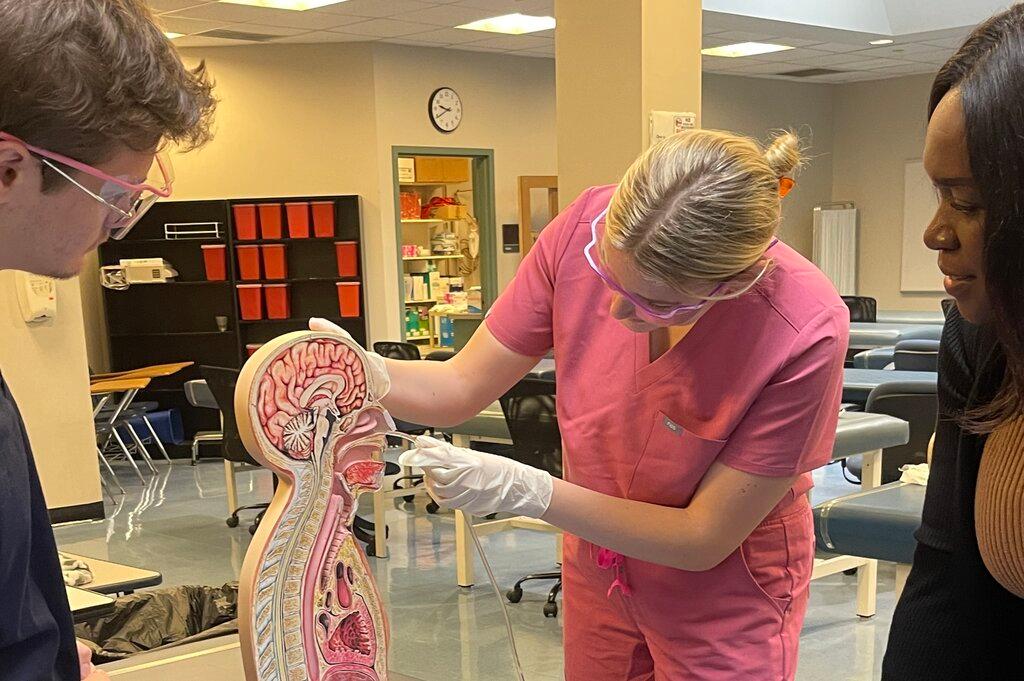 Dr. Zino supervises a Nasal Gastric placement