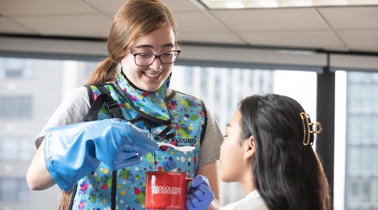 Student received oral exam from student doctor.