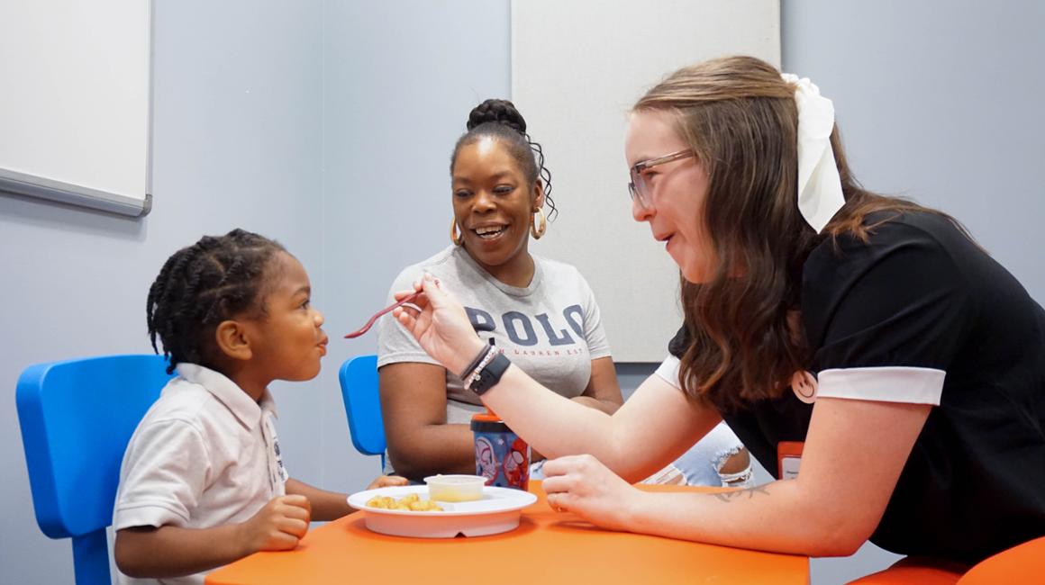 Pediatric Clinic youth working with student