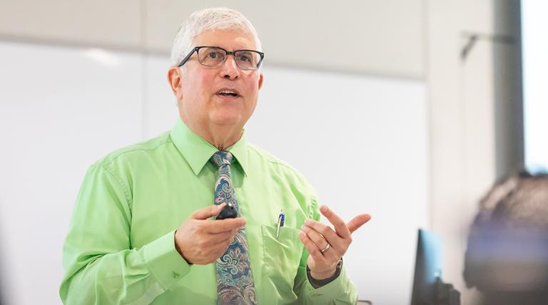 Law professor giving a lecture in a classroom