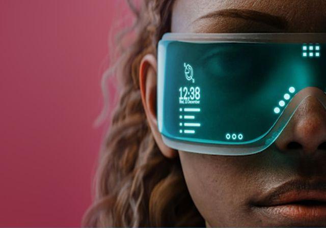 A woman wearing tech-enabled goggles, displaying the time and other symbols on a red background.
