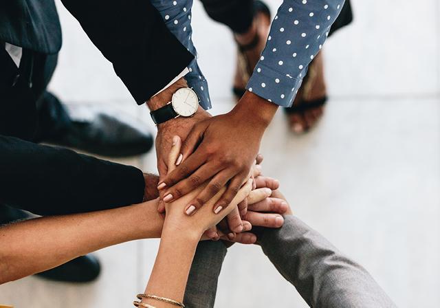Hands together in a circle