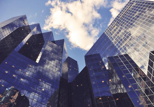 view of downtown buildings looking up at sky