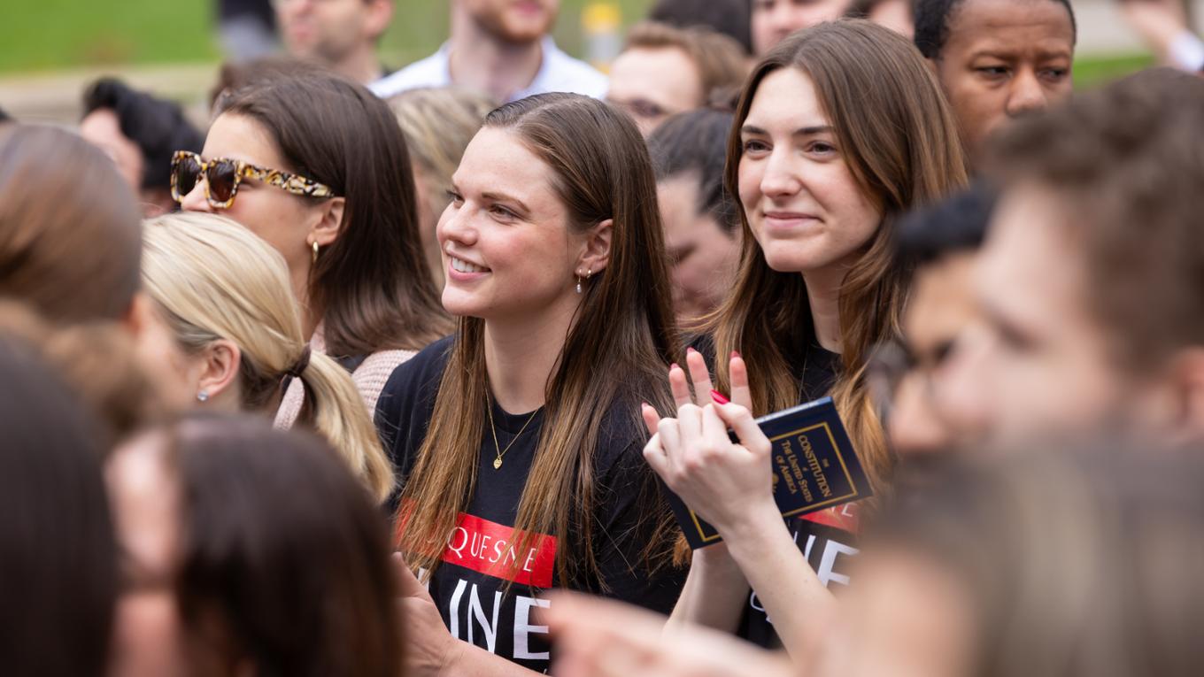 Students at the law school rededication ceremony