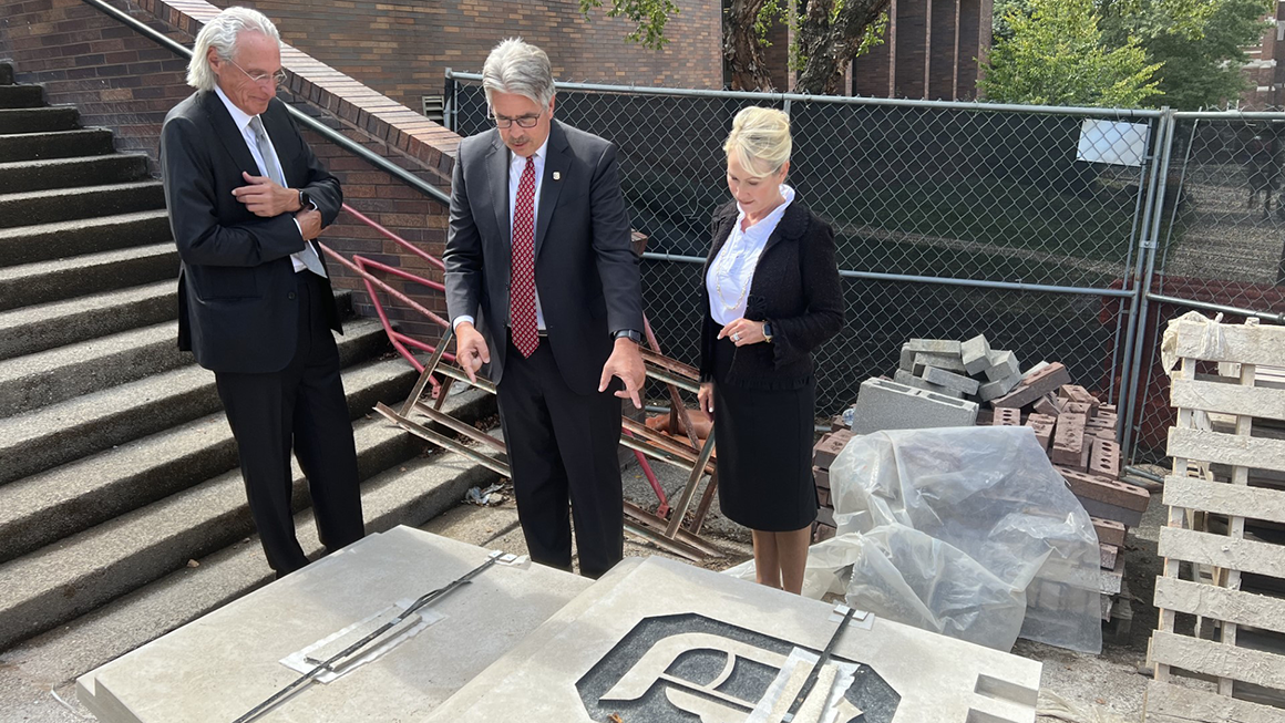 Kline, Gormley and Barton viewing contruction progress at the law school