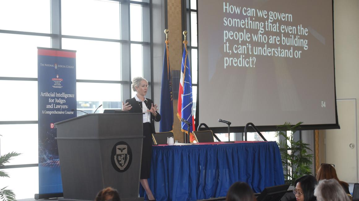 Dean April Barton presenting