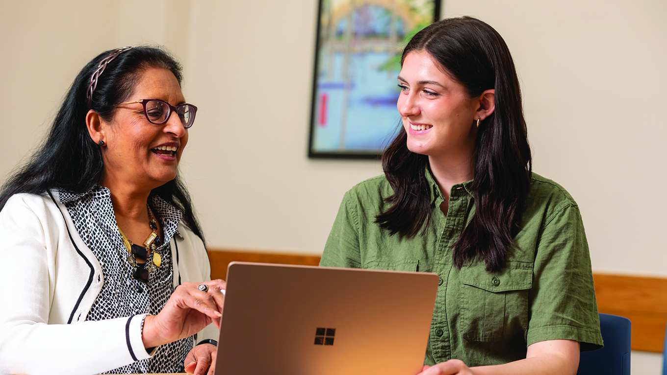 Duquesne student at a laptop working with a Student Success Coach 