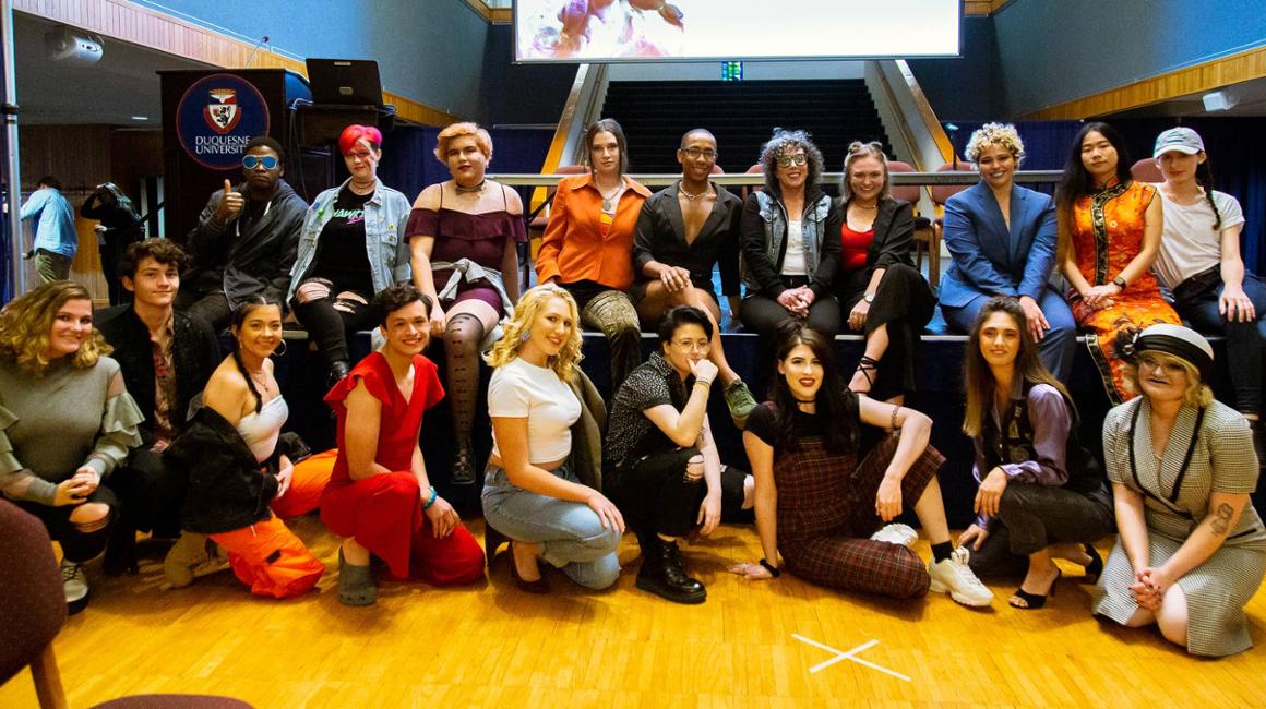 Group shot of students posing after gender neutral fashion show