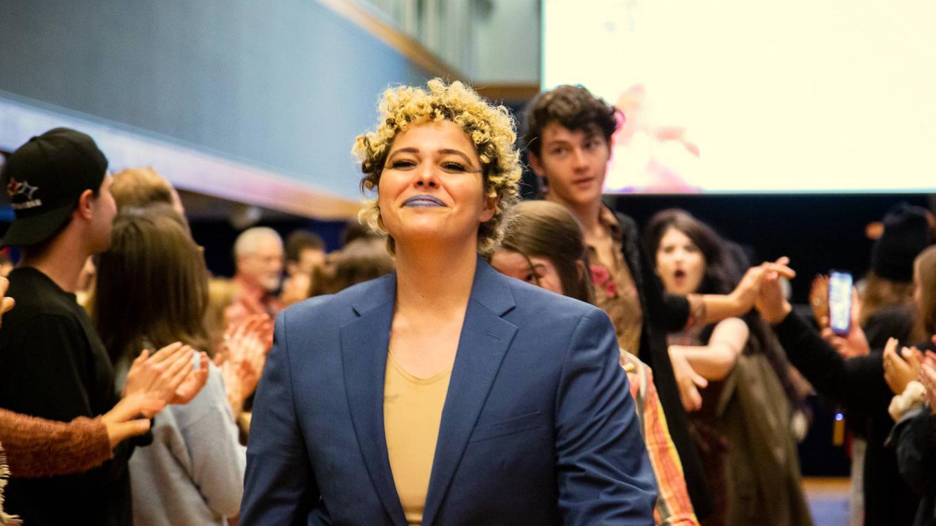 Student posing at gender neutral fashion show