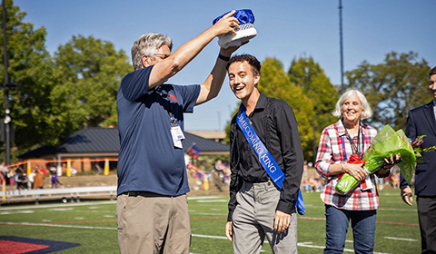 Braden Niles being crowned Homecoming King on Rooney Field.