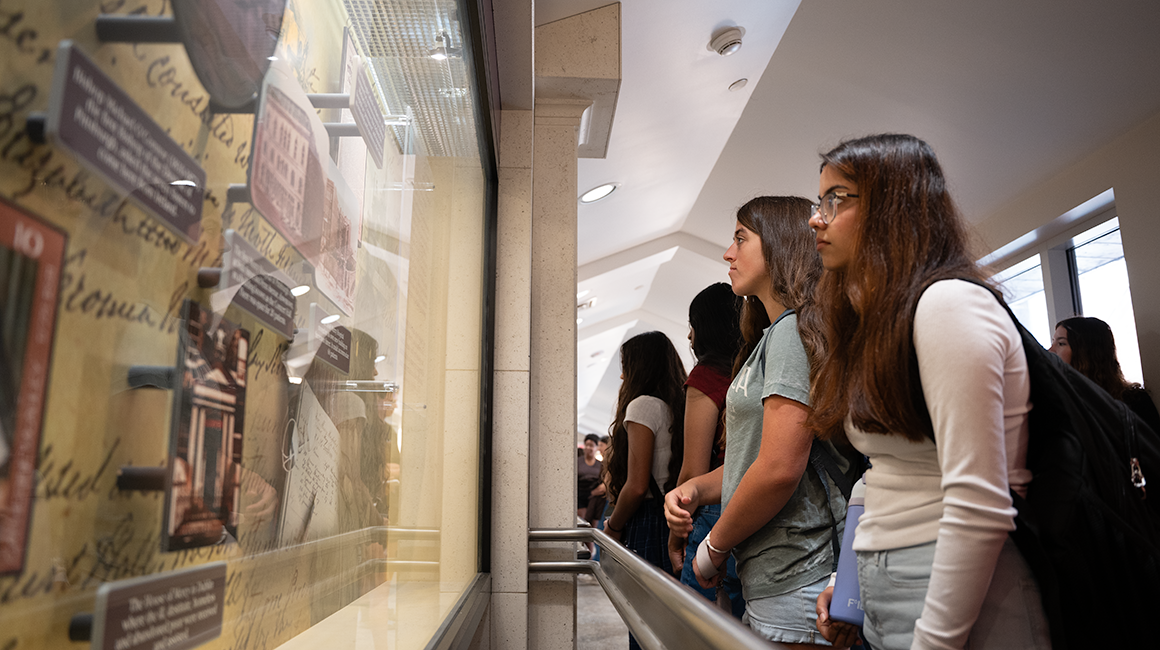 Students look at exhibit hosted by local museum.