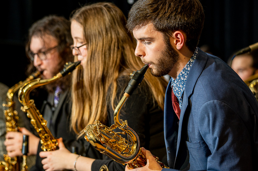 Saxophone section performs.