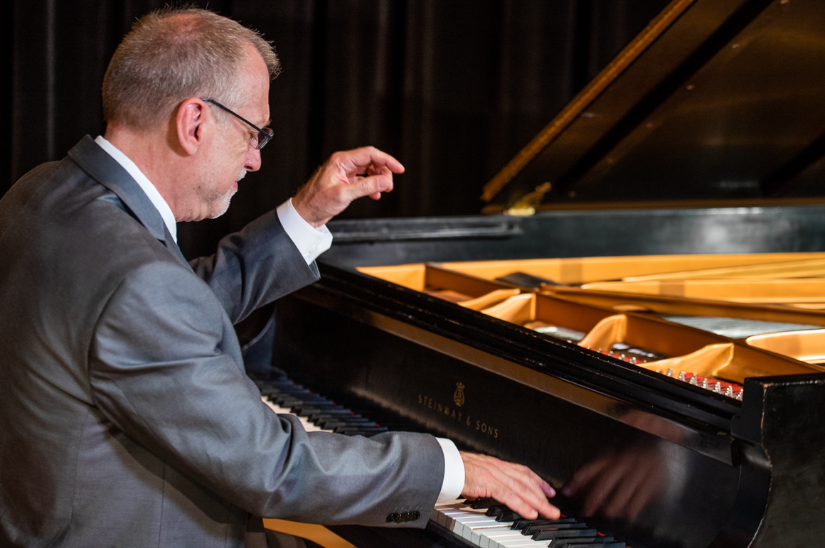 David Allen Wehr plays a piano.