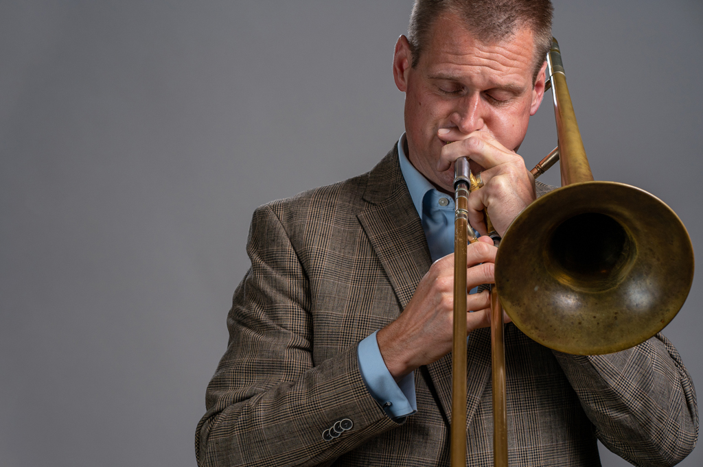 A trombone player performing.