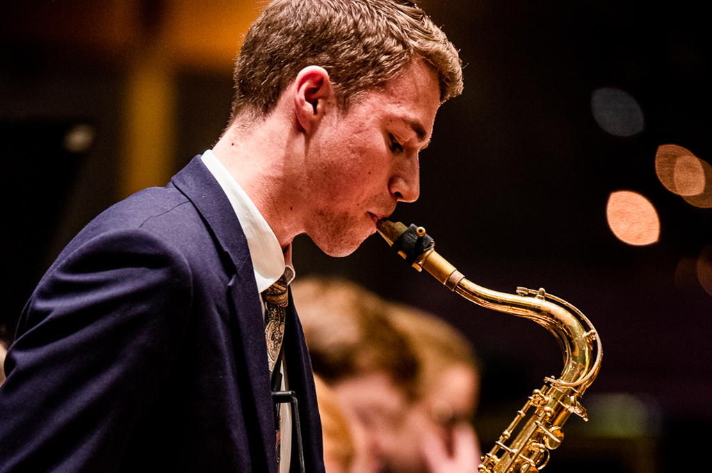 A saxophonist performs.