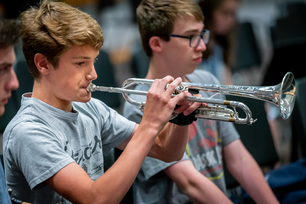 A student plays a trumpet.