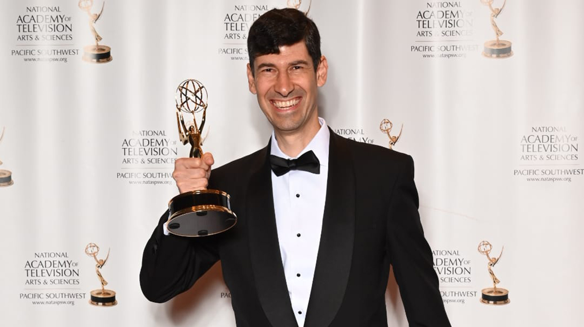 Percussion Area Coordinator hold an Emmy award.