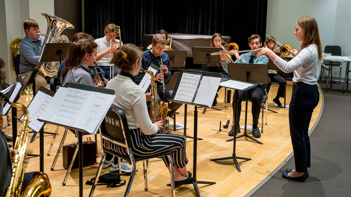 Student conducts an ensemble.