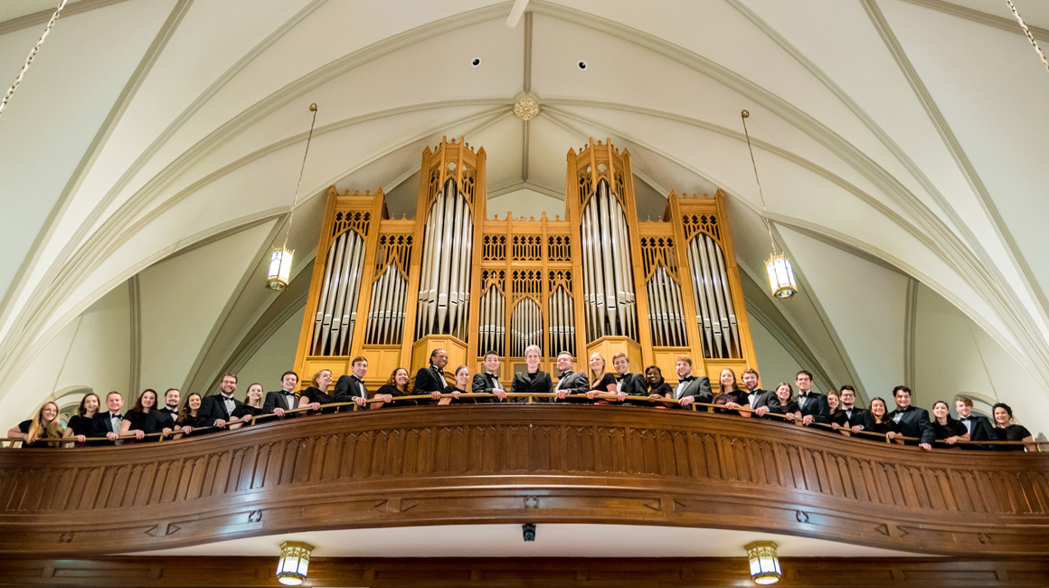 Voices of Spirit poses for a group photo in the Duquesne Chapel.