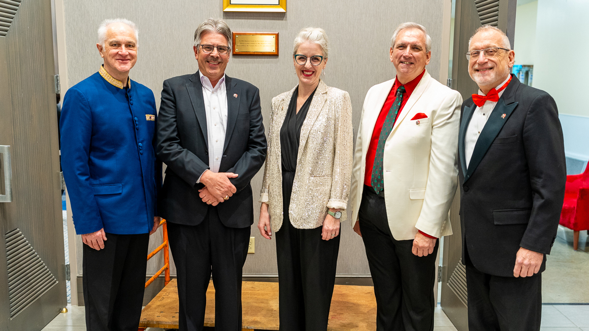 Directors and Dean pose with President Ken Gormley.
