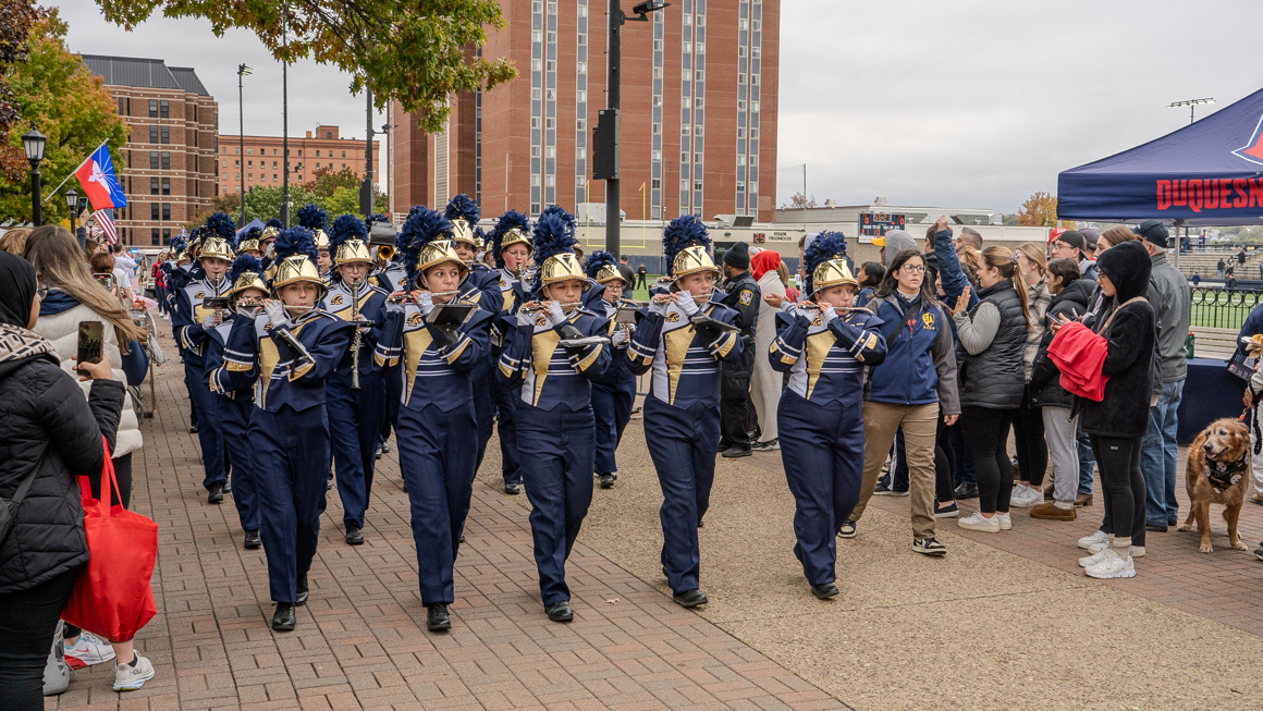 A marching band performs.