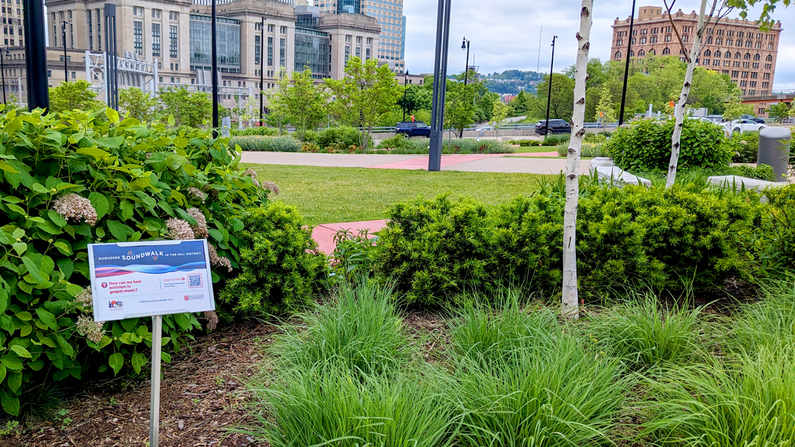 Soundwalk sign in a park.