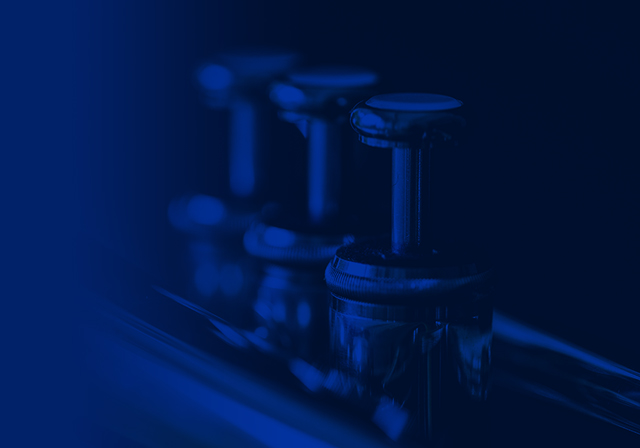 Blue image of trumpet valves