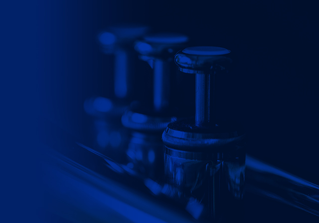 Blue graphic featuring trumpet valves.