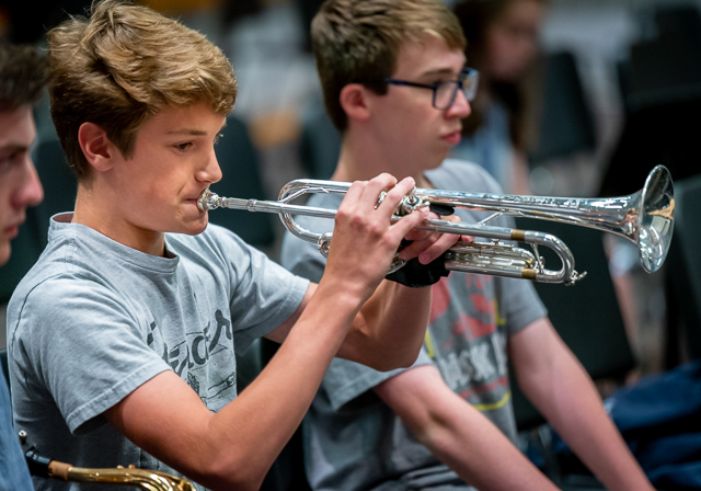 A student plays a trumpet.