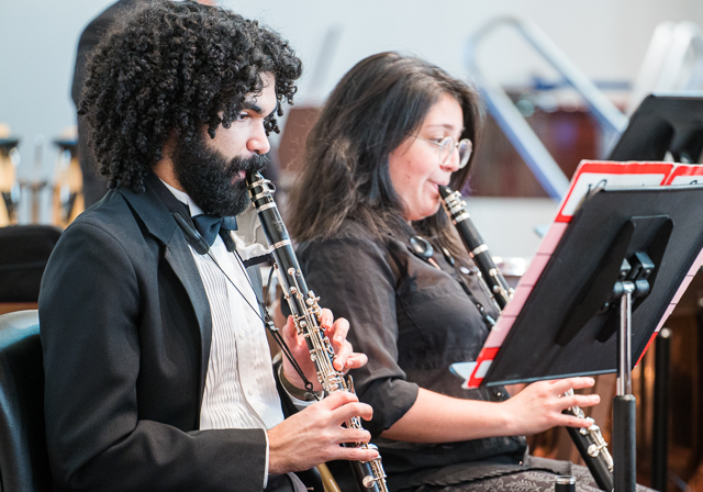 Two clarinet players perform.