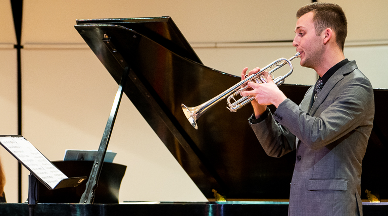 A trumpet player performs.