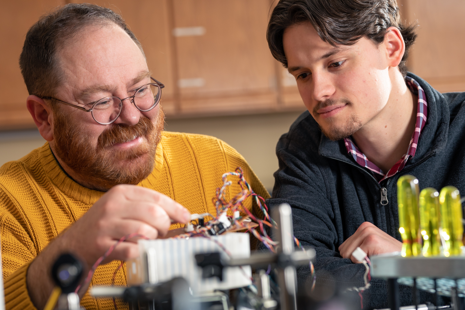 faculty member and student doing hands-on research