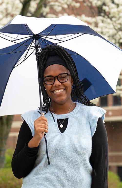 Girl holding an umbrella