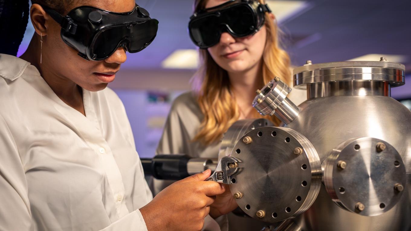 students working in physics lab