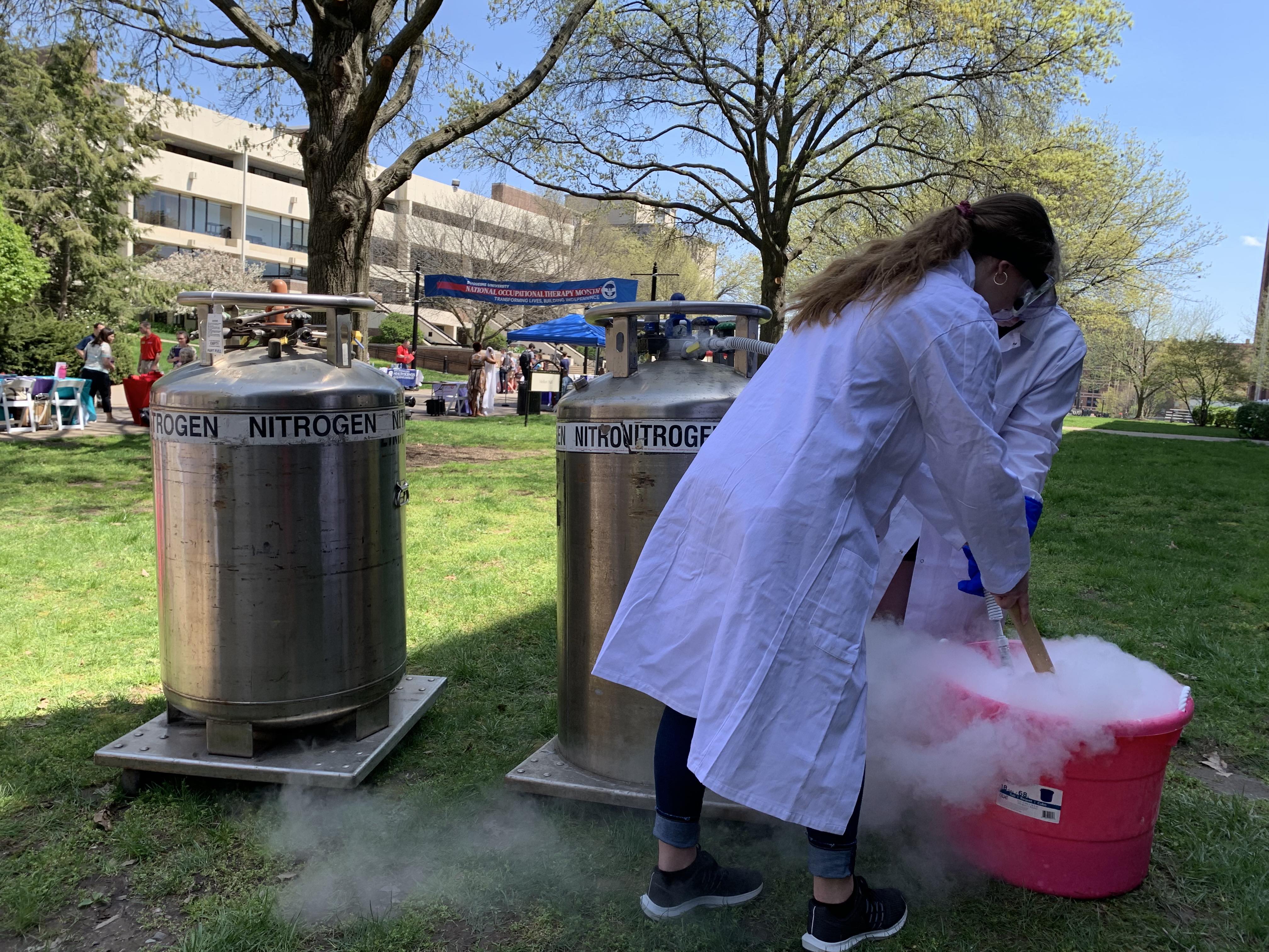 people making liquid nitrogen ice cream